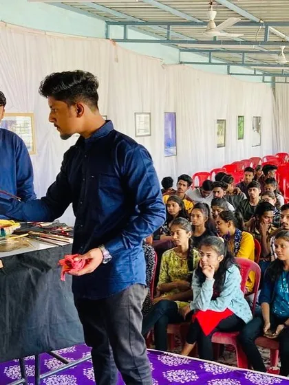Engaging with students during a live oil painting demonstration at Nav Krishna Valley College of Fine Art in Sangli. I believe in an interactive approach, answering questions about technique and materials throughout the session.