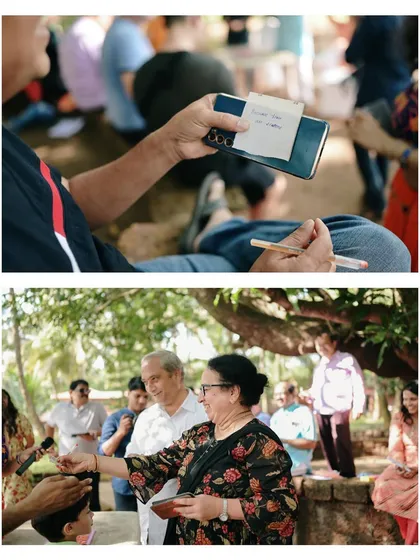 Guests participating in writing games and activities. These detail shots of candid moments add depth to the wedding album.