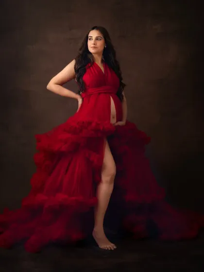 For the mama who wants all the drama and glamour. This bold, red tulle gown makes such a powerful statement. My studio sessions allow for these high fashion, magazine worthy maternity photos that celebrate your strength.