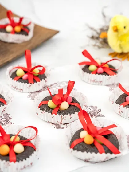 A batch of our chocolate Easter nests, each resting in a paper liner. They are a delightful little treat, perfect for adding to an Easter basket or enjoying on their own.