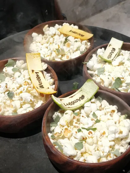 We even extend our personalization to food. For the "#IAm69+1" party, we served bowls of popcorn garnished with the same custom-stamped peels, creating a fun and cohesive experience.
