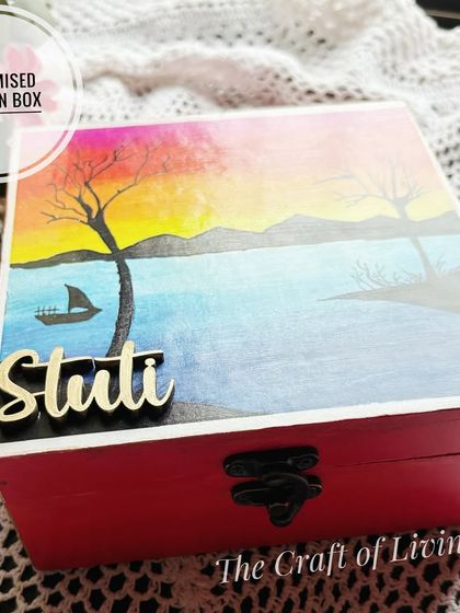 A beautiful hand-painted wooden box with a serene landscape design, personalized with the name "Stuti." Each box is a unique piece of art.