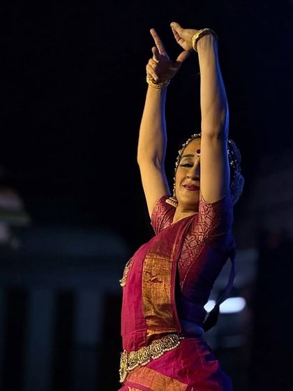 Reaching upwards towards the divine during my performance at the ancient Kapaleeshwarar Temple.