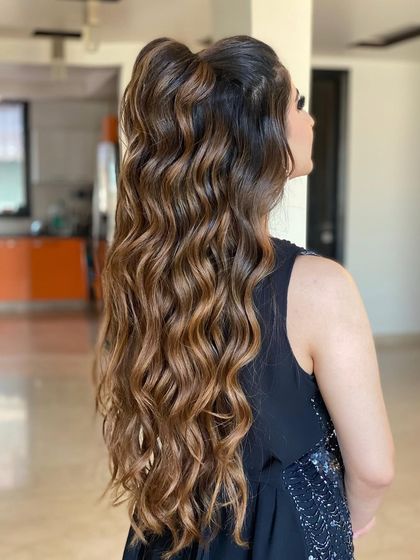 A half-tie wavy look taught in my masterclass. This style is a perfect blend of a chic updo and glamorous open hair.