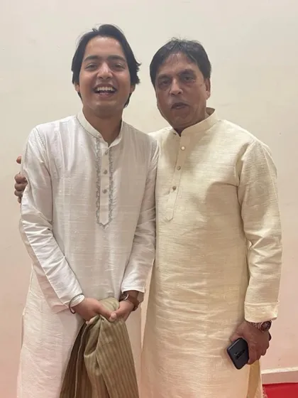 A happy, candid moment with my father. He is my first teacher and my constant source of inspiration.
