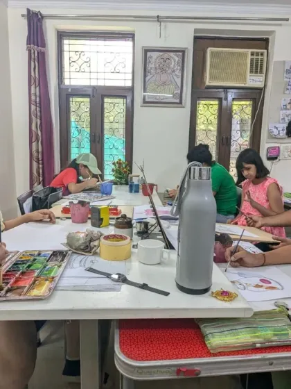 A typical class scene with students deeply engaged in their watercolor paintings. We encourage a focused yet relaxed atmosphere for learning.