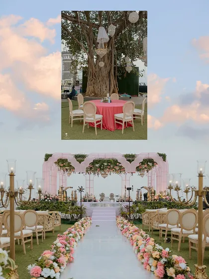 A panoramic view of a pastel-themed wedding setup by the sea. The elegant floral aisle, the grand mandap, and the whimsical guest seating under a large banyan tree all come together to create a dreamy, romantic atmosphere.