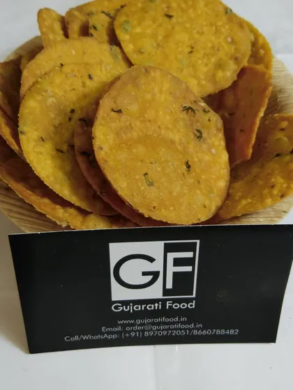 These are my crispy Methi Puri, a savory fried bread flavored with fenugreek leaves. They are a perfect dry snack to keep in your pantry for guests or for a quick bite.
