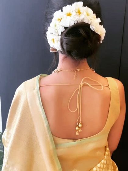 A detailed look at the beautiful gajra bun we created for Harshita. A classic floral hairstyle is the perfect accessory for a traditional silk saree.
