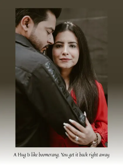 A close-up portrait focusing on the bride's serene expression as she receives a hug from her partner, a simple and powerful image of comfort and love.