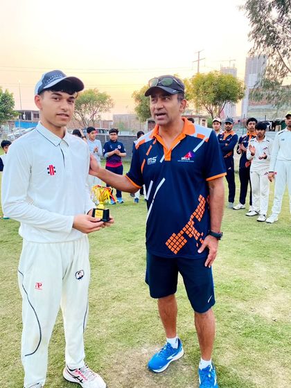 Recognizing excellence is part of our culture. Here, I am presenting the 'Best Batsman of the Month' award for February to a deserving trainee for his consistent performance.