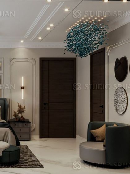 This bedroom in Krishna Park has a neo-classical feel, with wall moldings, a unique blue-green chandelier, and dark, elegant furniture.