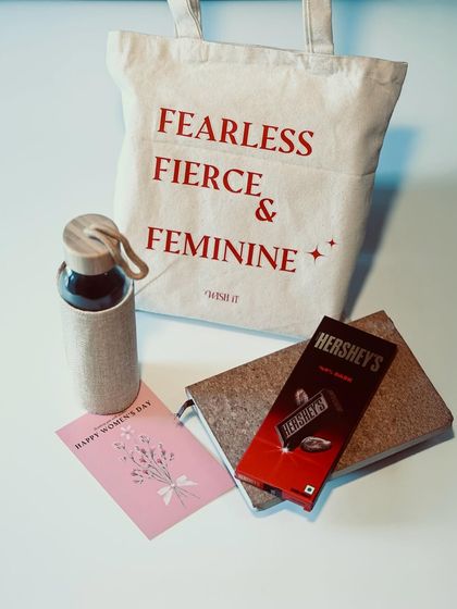 "The Everyday Tote" hamper is chic, useful, and eco-friendly. It includes a reusable tote bag, a cork diary, a water bottle, and a bar of chocolate.