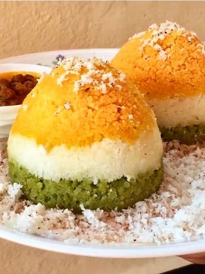 This stunning tricolor puttu, a steamed rice and coconut cake, is a creative and patriotic take on a traditional Keralan breakfast.