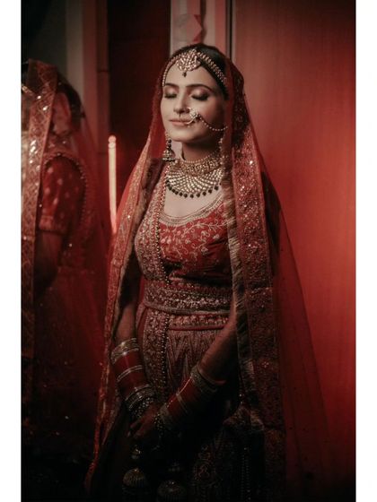 Another beautiful portrait of Vaishali, her reflection in a mirror adding depth and a touch of glamour.