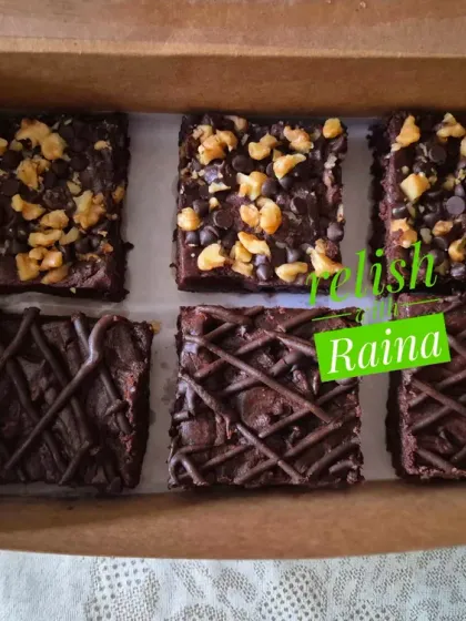 A box of my assorted Ragi Brownies. I make these with nutrient-rich ragi flour instead of all-purpose flour, but they are just as rich, fudgy, and dense as regular brownies. This box includes Choco-Walnut, Double Chocolate, and Nutella flavors.