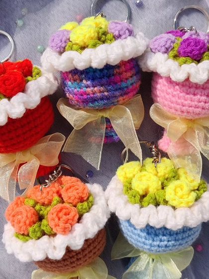 My most popular item, the mini bouquet keychain. I create these in various flower types like roses and sunflowers, and in a wide range of color combinations.