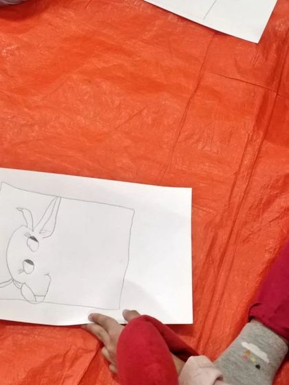 A close-up of a child's drawing of Beauty the Buffalo. Everyone's creation is unique, and it's wonderful to see their confidence grow as they draw.