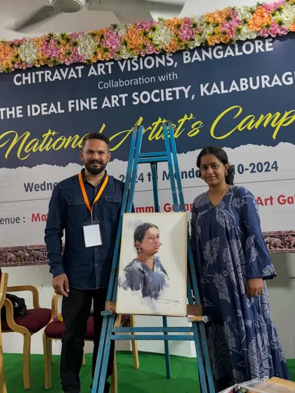 With the model and the finished portrait at a National Artist's Camp in Kalaburagi, Karnataka.