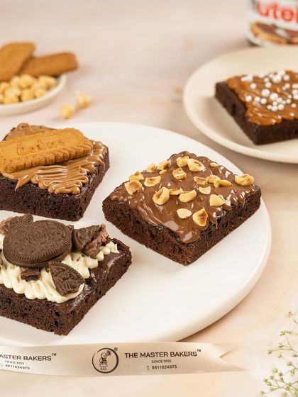 A closer look at our irresistible brownie collection. Each one is fudgy, rich, and loaded with toppings to satisfy any craving you might have.