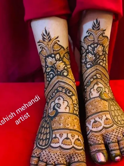 Don't forget the feet! I create stunning foot mehandi with sharp details, like these peacock and jhumka designs, to complete your bridal look from head to toe.