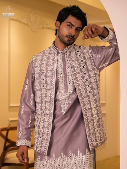 A confident pose in the lilac Indo-Western set. This image captures the modern, fashion-forward spirit of the man who chooses to wear my designs.