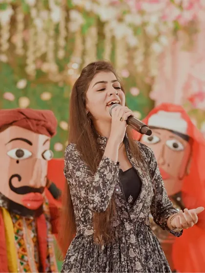 Performing at a Maayra event in Raipur with traditional puppeteers in the background. We can arrange for other folk artists to enhance the cultural experience.