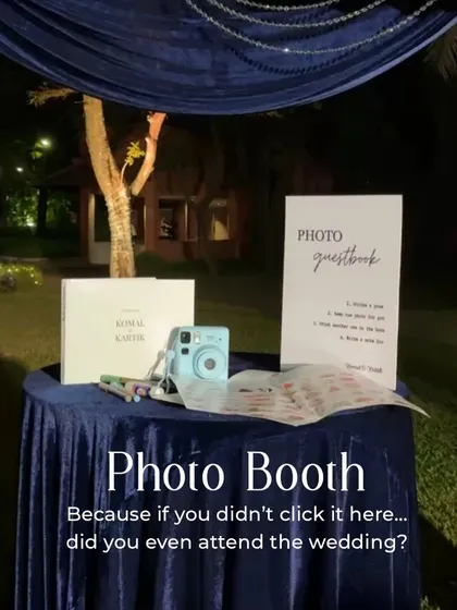 A simple yet charming photo guestbook station. Guests can snap a polaroid and leave a message, creating a tangible collection of memories for the hosts.