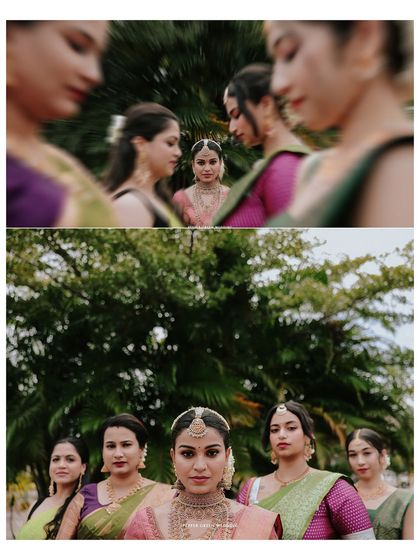 An artistic group portrait of the bride and her bridesmaids, the focus creating a sense of depth and connection.
