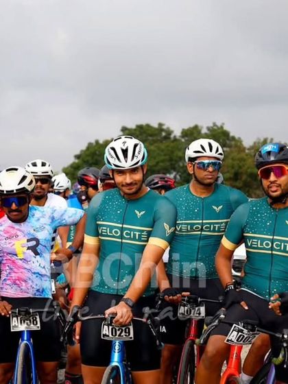 Riders from the Veloci-T racing team at the start line, showing their team spirit and readiness to compete.