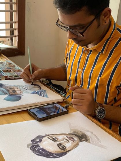 A student from our certification program works on a detailed watercolor portrait. His journey from his hometown to Bangalore just for our classes shows true dedication.