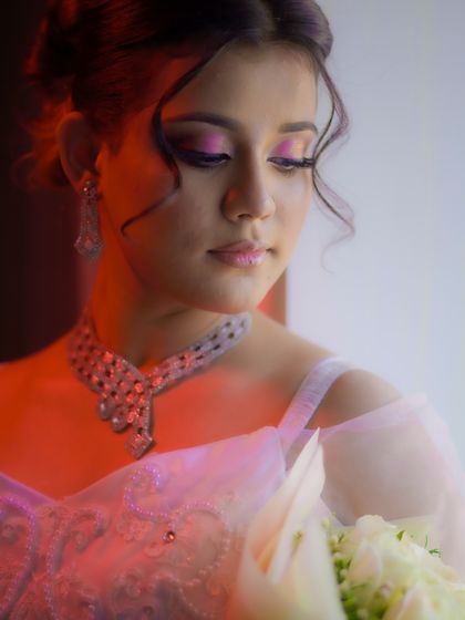 A beautiful, serene portrait that captures the innocence and joy of a bride on her special day.