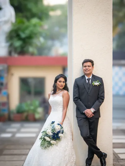 A stylish wedding portrait using the architecture of the location. The bride and groom look effortlessly cool in this modern and elegant shot.