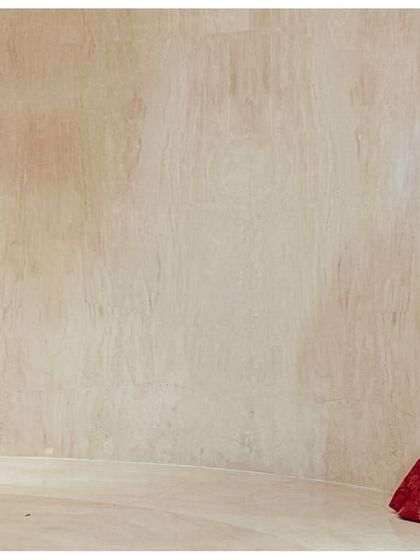 A wide shot showing the space between Katyayni and Kunal just before they meet for their first look. This composition builds tension and anticipation for the moment they come together.