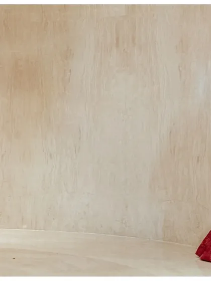 A wide shot showing the space between Katyayni and Kunal just before they meet for their first look. This composition builds tension and anticipation for the moment they come together.