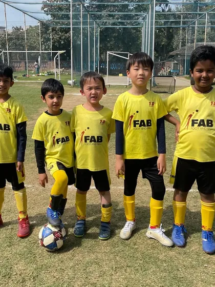 A team photo after a good game. The smiles on their faces reflect the bond forged through teamwork and the satisfaction of giving it their all.