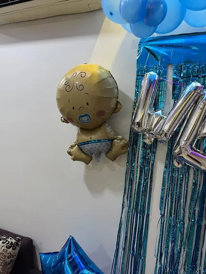 A close-up of the cute baby boy foil balloon.