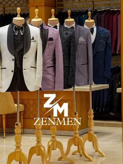Another shot of the tuxedo collection, highlighting the white tuxedo with a black shawl lapel as the centerpiece.