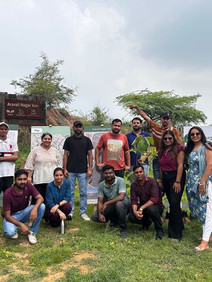 The Beumer Group team poses for a group photo after a successful day of planting, their efforts contributing to a healthier planet.