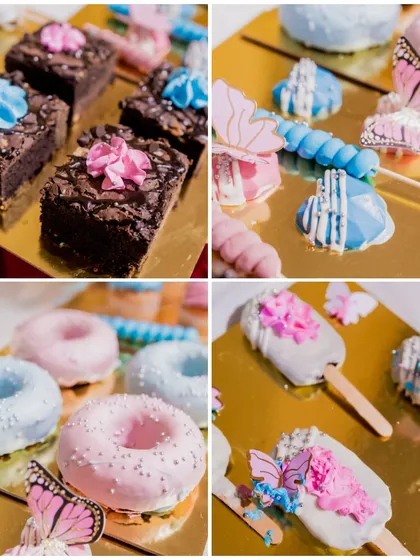 We love bringing a theme to life with sweets. This butterfly-themed dessert table features a colorful assortment of brownies, donuts, cakesicles, and cake pops, all coordinated for a magical celebration.