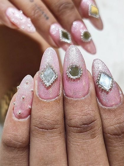 A close-up of the mirror work nails, showing the texture and reflection of the embellishments. These are designed to catch every light on the dance floor.