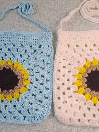 A side-by-side look at two of my sunflower sling bags in sky blue and classic white. These bags are lightweight and perfect for carrying your essentials.