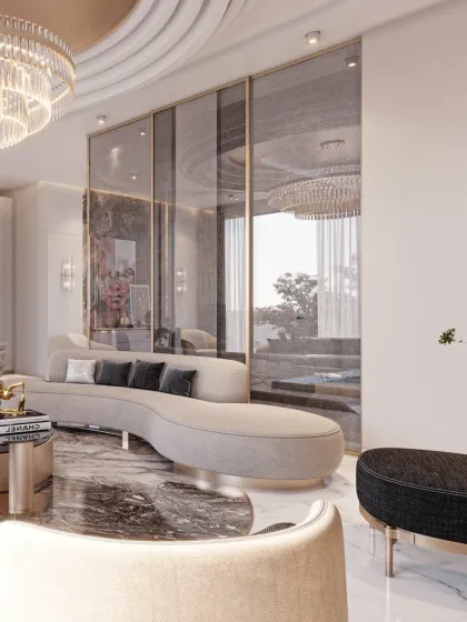 The interplay of materials is key in this space. The rich marble floor, soft fabric of the sofa, and metallic accents on the coffee table create a tactile and visually engaging experience.