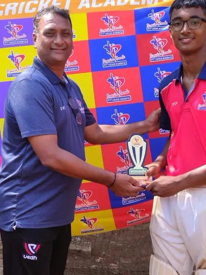 A U-14 player receives his Man of the Match award from a coach, a regular feature of our PTPL matches.