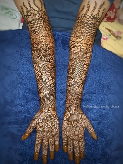 Bridal henna for Sanaya, featuring a beautiful mix of floral elements, checkerboard fills, and delicate vine work.