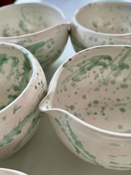 These are the pouring bowls, or 'katakuchi', for the matcha set. I used the same green splash glaze technique to create a cohesive collection.