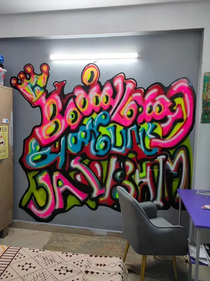 This is the hero piece for my daughter's bedroom, a bold graffiti mural that reads "Kanmani Anbodu Jai Bhim" (With love, my precious, Victory to Bhim). It combines my love for Tamil script, vibrant spray paint art, and our family's belief in Dr. Ambedkar's ideals. This is how I transform a personal space into a powerful statement wall.