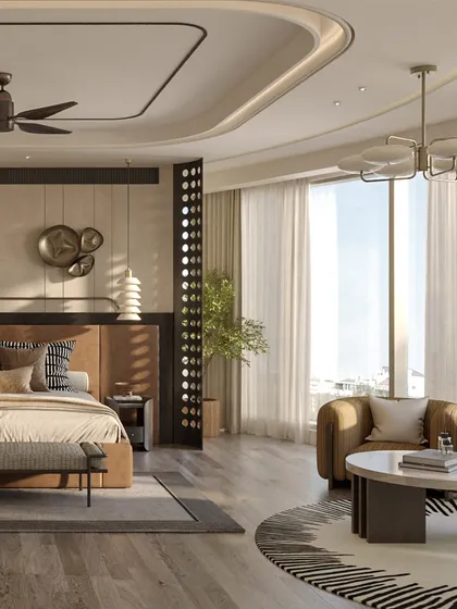 A dedicated seating area by the large window creates a perfect spot for morning coffee or quiet reading. The design ensures the bedroom is not just for sleeping but is a multi-functional space for relaxation, complete with a stylish armchair and a modern chandelier.