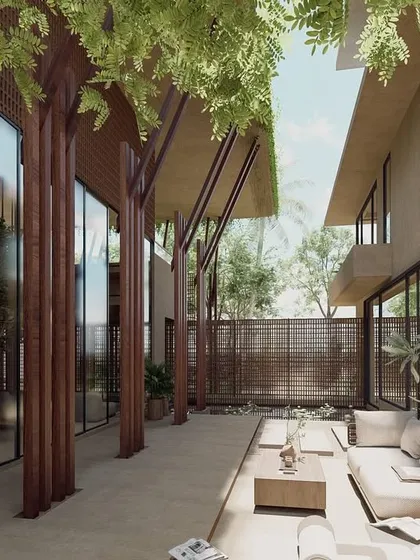 An outdoor lounge area for The Sanctuary project in Hyderabad. This space serves as an extension of the indoor living areas, designed with wooden screens and lush planting to create a private, shaded urban oasis.