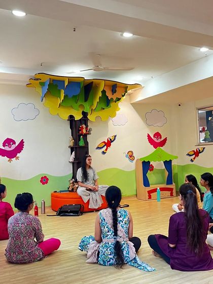 I often bring the traditional gurukul system into my modern classroom. Here, we sit together to discuss the stories and theories behind the dance, creating a deeper connection to the art.